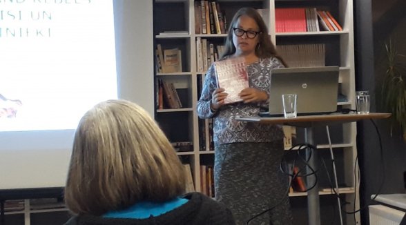 Granddaughter of Senator Augusts Rumpeters gives her book to Supreme Court Museum